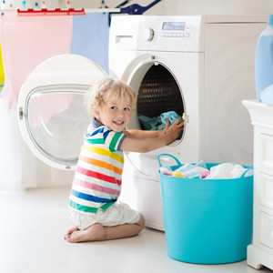 little girl happy laundry