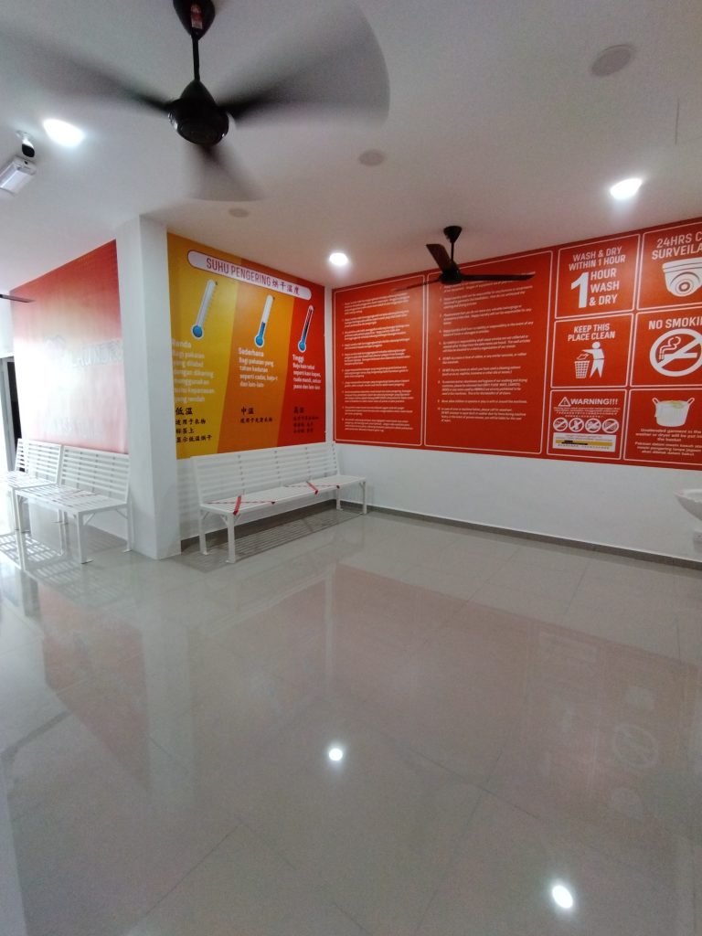 spacious and cozy waiting areas at happy laundry bayan baru