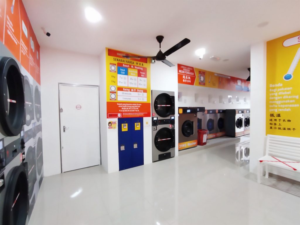 happy laundry bayan baru token machines